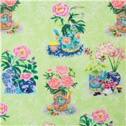 tela verde con dise&ntilde;o floral y jarrones arcoiris