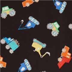 Tissu en coton noir avec des tracteurs engins jaunes orange Tissu par Michael Miller