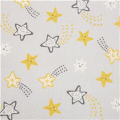Tissu coton gris avec d'adorables toiles filantes souriantes jaunes Tissu par Michael Miller