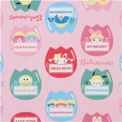Tissu Oxford rose avec des badges avec les personnages Tissu par Sanrio