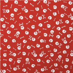 Tissu rouge avec des ttes de mort et des os croiss Tissu par Timeless Treasures