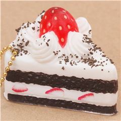 small white and dark brown cake with strawberry squishy Cafe de N 