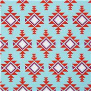 Tissu en coton bleu avec des losanges et des triangles orange