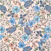 Tissu en coton rose pêche fleurs bleues romantiques