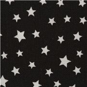 Tela de estrellas salpicadas sobre fondo negro algodón