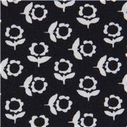 Tela de punto azul marino de Stof Fabrics con mini flores blancas
