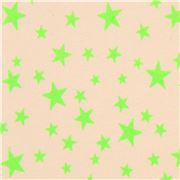tessuto beige stelle verde neon in maglina dal Giappone