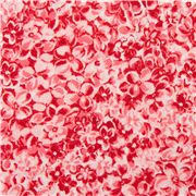 Tissu en coton avec des fleurs rouges et roses