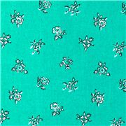 Tissu bleu sarcelle avec des petits bouquets à contours blancs