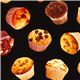 black designer fabric with tossed muffins pastry 1