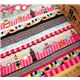 pink robot fabric with many colourful elements 0.5m 1