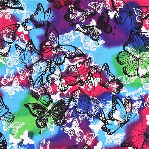 Tissu en coton avec des patchs bleus violets verts roses avec des papillons Tissu