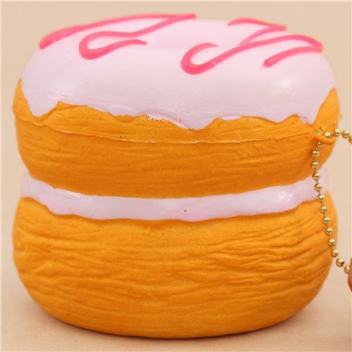 Cafe de N Squishy kawaii en forme de beignet-croissant avec un glaçage rose 2