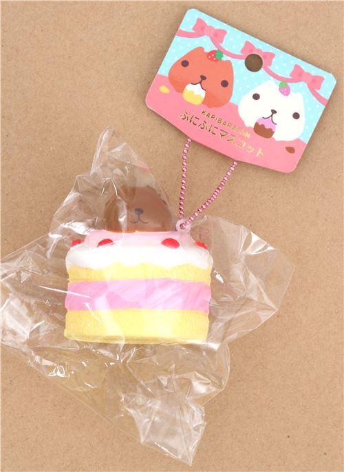 Squishy  kawaii avec Kapibarasan en forme de gteau jaune et rose 5