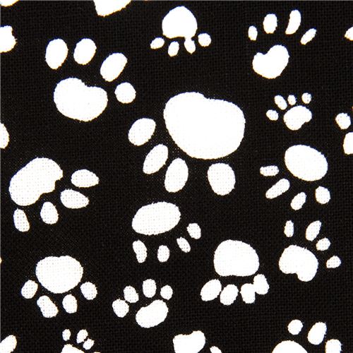Tissu Timeless Treasures noir avec des pattes blanches Tissu