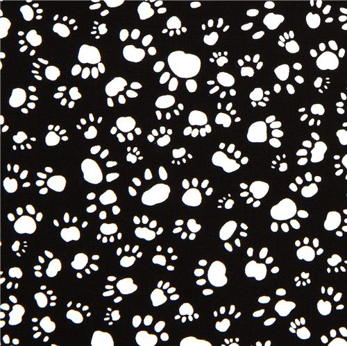 schwarzer Timeless Treasures Stoff wei�e Pfotenabdr�cke 2