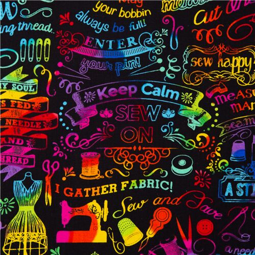 Tela negra de Timeless Treasures palabras de costura inglés en colores arcoiris Tela