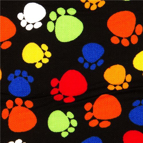 Tessuto firmato nero con coloratissime orme di gatto Tessuto