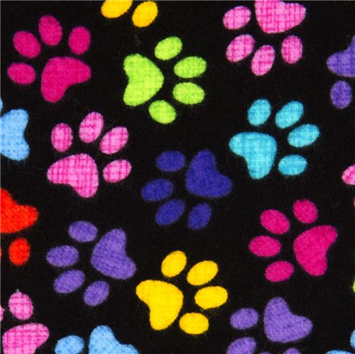 black designer flannel fabric with colourful paw prints 1