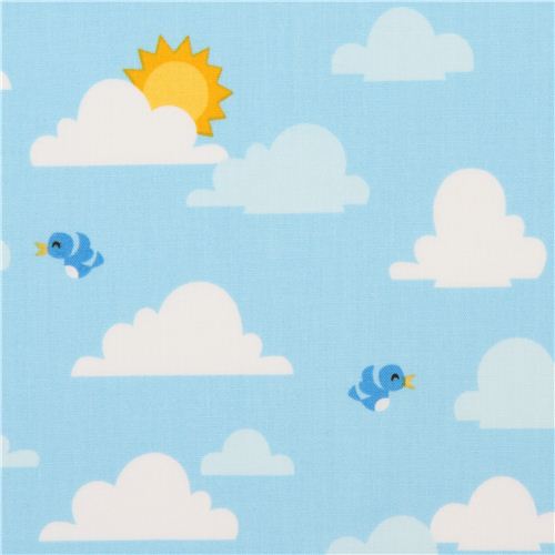 blue clouds sun and bird fabric by Robert Kaufman USA Fabric