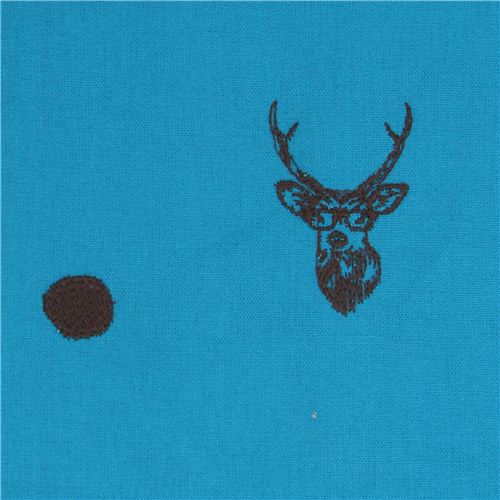 Toile echino bleue brodée avec des têtes de cerfs et des pois Tissu