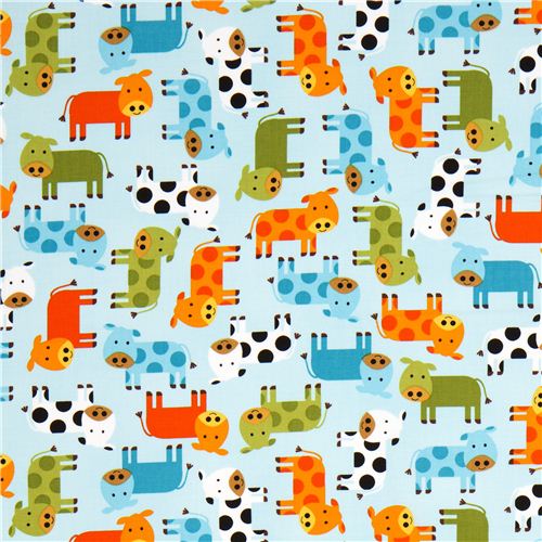 blue fabric with dotted cows by Robert Kaufman USA 2