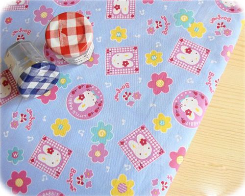 blue kawaii fabric with bunnies flowers Tessuto