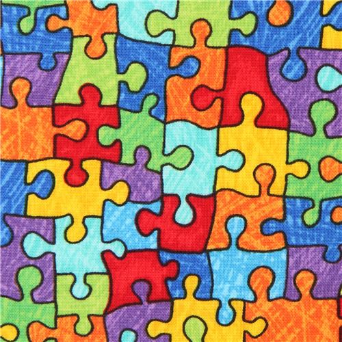 Tissu Timeless Treasures multicolore avec des pièces de puzzle Tissu