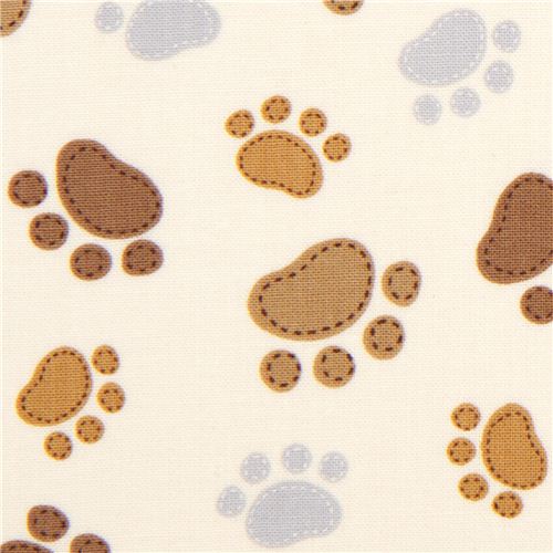 cream Timeless Treasures fabric with funny paw prints 1