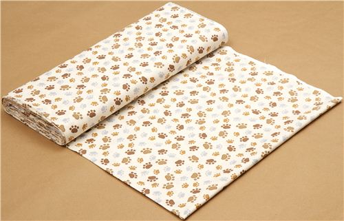 cream Timeless Treasures fabric with funny paw prints 3