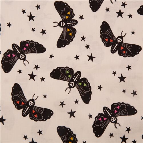 cremefarbener US-Stoff schwarze Motten Symbole Sterne Alexander Henry Stoff