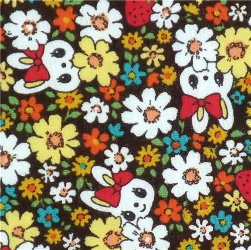 Bonita tela Kokka con flores conejitos de Japón Tela
