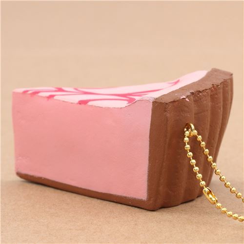Squishy Cafe de N , part de gâteau cheesecake rose avec un coulis fuchsia 3