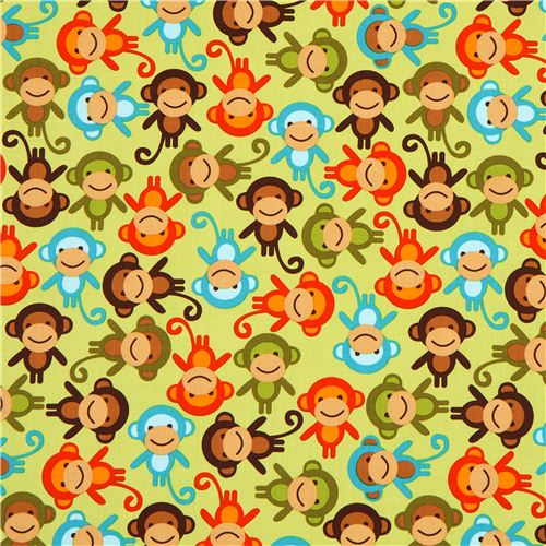 green fabric with colourful monkeys by Robert Kaufman 2