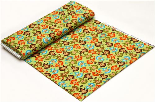 green fabric with colourful monkeys by Robert Kaufman 3