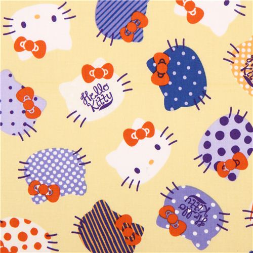 light yellow Hello Kitty cute face fabric by Kokka 