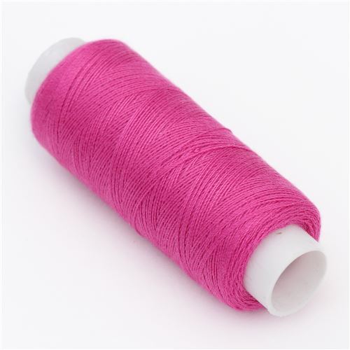 Bobine de fil magenta 42