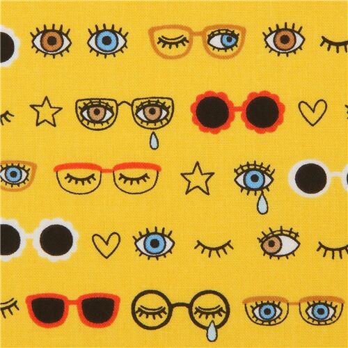 marigold yellow fabric from Japan with eyes and sunglasses by Kokka Fabric