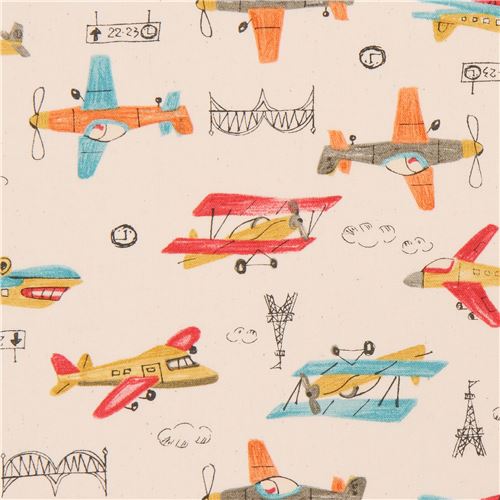 Tissu Oxford au coloris naturel avec des avions multicolores import du Japon Tissu