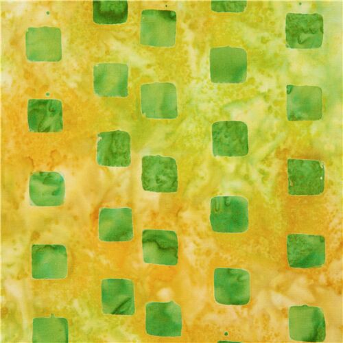 Tissu en coton orange style batik paro aspect teint cubes de glace verts Tissu