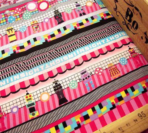 pink robot fabric with many colourful elements 0.5m 1