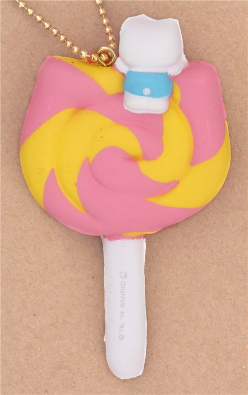 ciondolo squishy Hello Kitty lecca-lecca rosa spirale giallo fiocco rosso 2