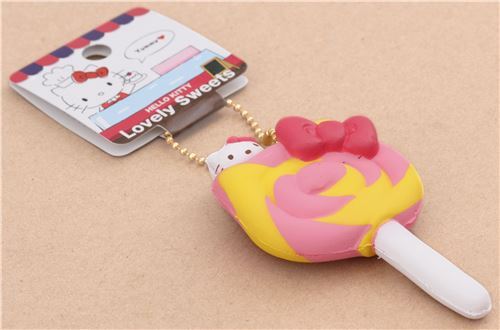 ciondolo squishy Hello Kitty lecca-lecca rosa spirale giallo fiocco rosso 4