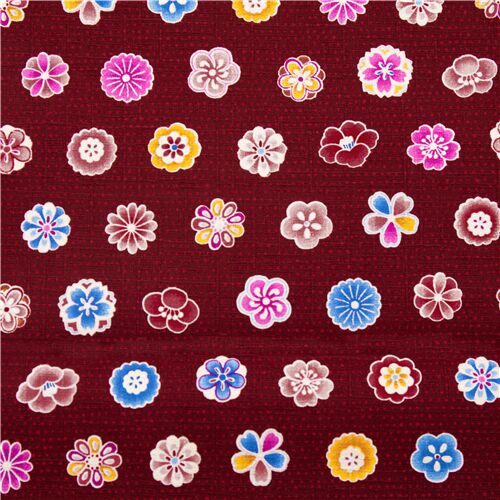 Tela dobby granate de Japón con hileras de flores de colores vivos de Cosmo Tela