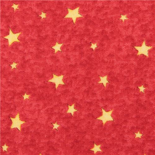 red fabric with small yellow stars Quilting Treasures