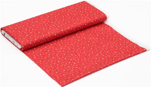 red fabric with small yellow stars Quilting Treasures 3