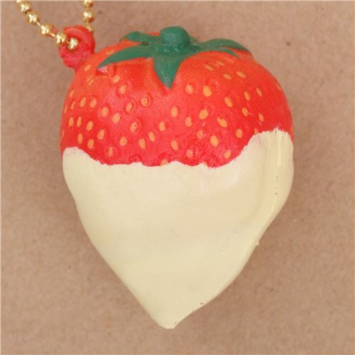 red strawberry with pale yellow sauce squishy Cafe de N