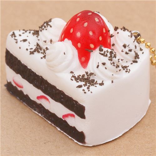 small white and dark brown cake with strawberry squishy Cafe de N 2
