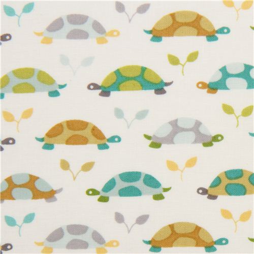 Tissu blanc Michael Miller avec des tortues bleu sarcelle Tissu