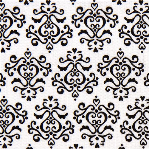 white Riley Blake laminate fabric with black ornaments 1